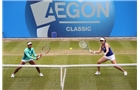 BIRMINGHAM, ENGLAND - JUNE 14:  Abigail Spears of the USA (R) and Raquel Kops-Jones (L) of the USA in action during their doubles semi-final match against Cara Black of Zimbabwe and Sania Mirza of India during day six of the Aegon Classic at Edgbaston Priory Club on June 14, 2014 in Birmingham, England.  (Photo by Jordan Mansfield/Getty Images for Aegon)